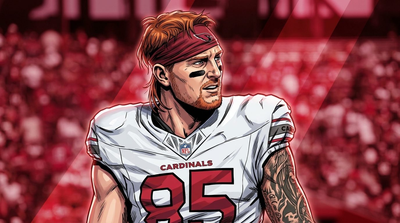 Comic-styled illustration of Arizona Cardinals tight end Trey McBride in his white road jersey with red number 85, calm expression, red color wash and light-streak effect over a blurred stadium crowd background
